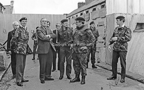 Secretary of State for N Ireland, William Whitelaw, visits British troops serving in Derry. Major General Robert Ford, Commander of Land Forces accompanied him. The no-go areas of Derry were the focus of his trip and pressure from the UDA would force Whitelaw to take action against them 