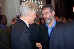 Gerry Adams chats with Bill Clinton at the Clinton Global Initiative in New York